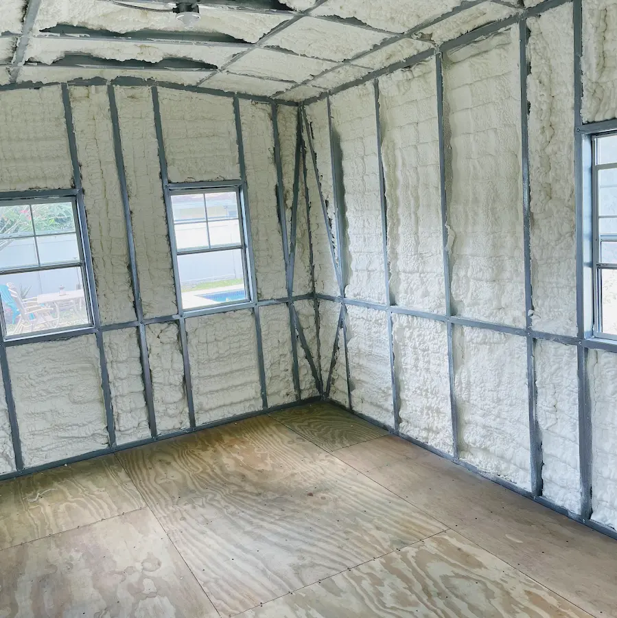 Closed-cell spray foam insulation applied to wall cavities in a residential project in St. Johns